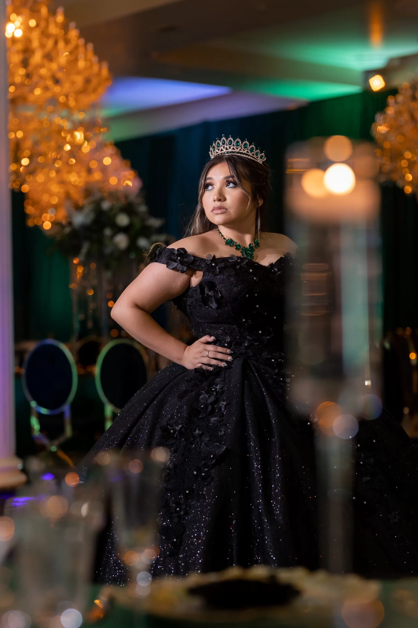 Emerald and black quinceañera with gold accents
