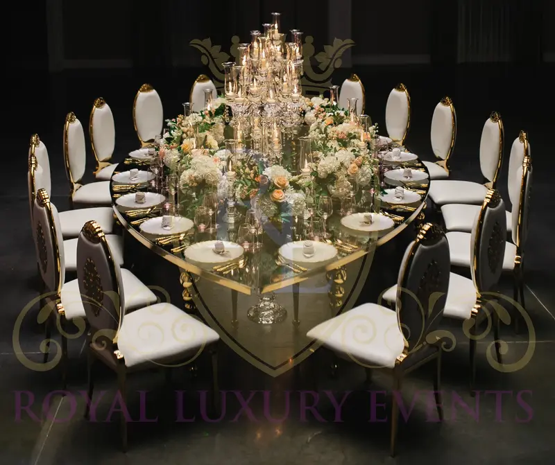 View this stunning gold teardrop dining table rental from Royal Luxury Events in Houston, Texas, perfect for any event or wedding.