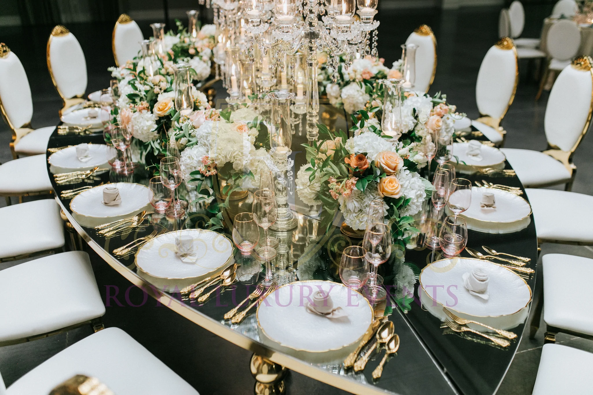 View this stunning gold teardrop dining table rental from Royal Luxury Events in Houston, Texas, perfect for any event or wedding.
