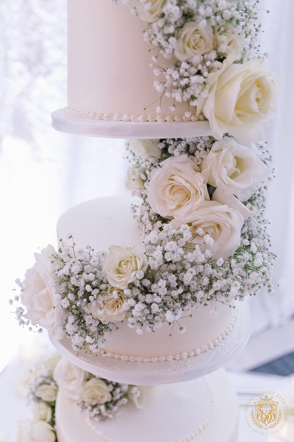wedding reception decor houston - centerpieces - babys breath sweetheart table - wedding cake