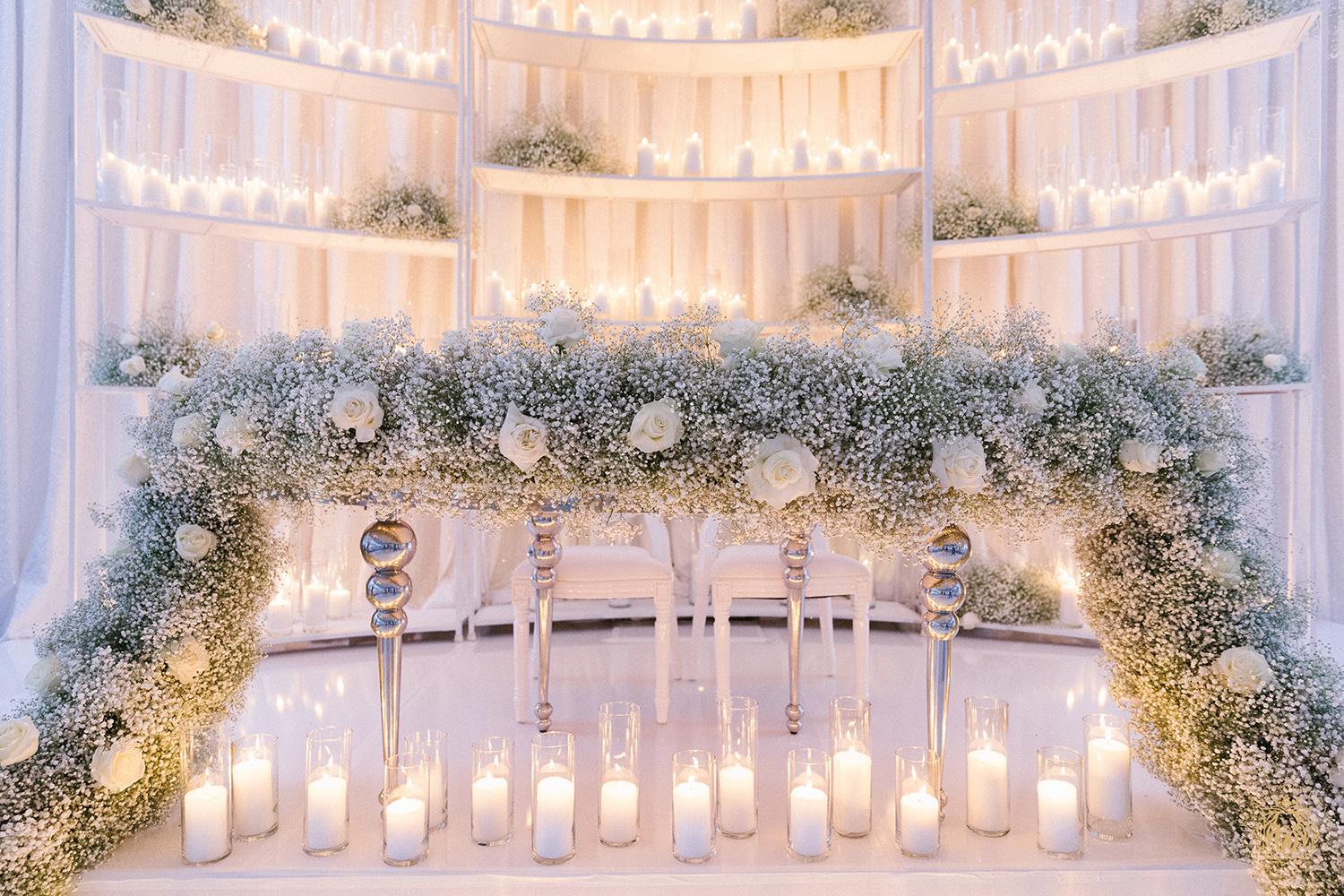 wedding reception decor houston - centerpieces - babys breath sweetheart table - candles