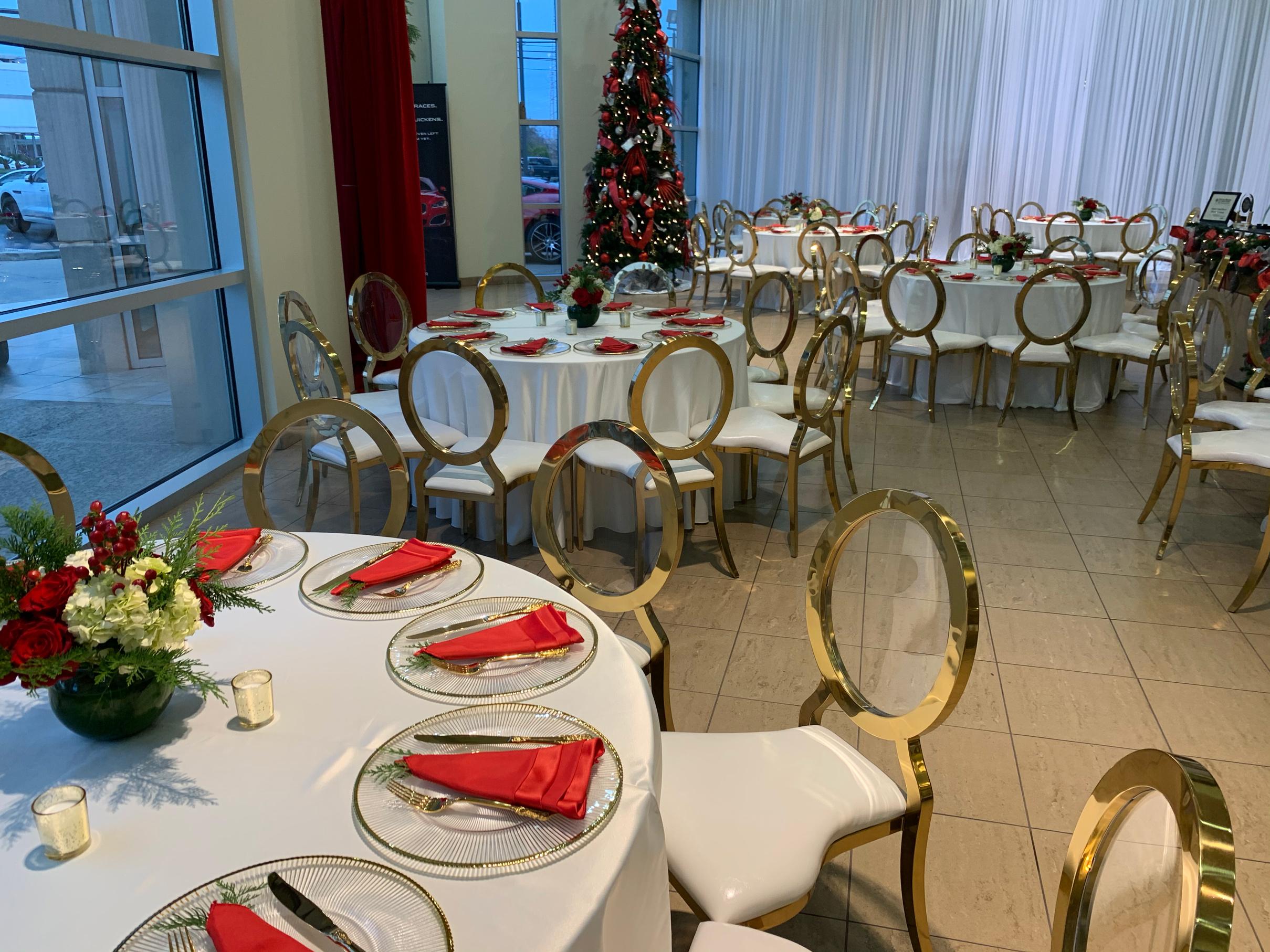 jaguar holiday party with red and white flowers