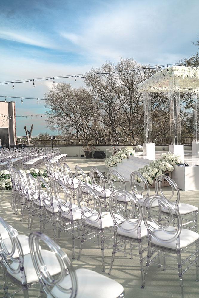 mirror aisle, royal luxury events, ceremony decor, ivory flowers, canopy, cross, clear chairs