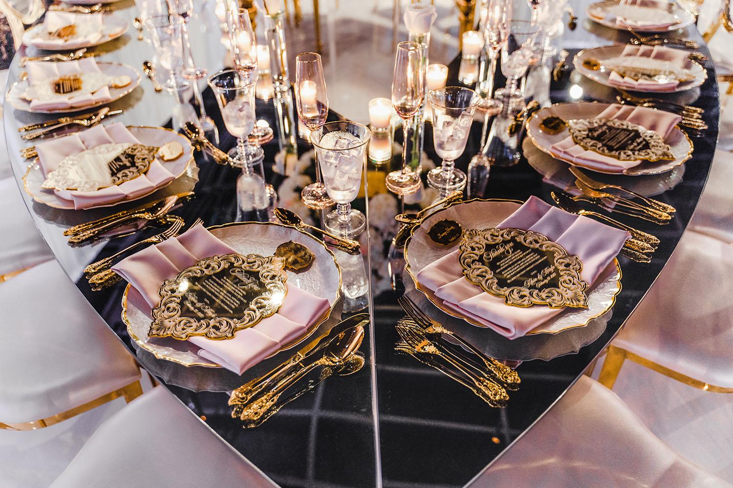 ceiling decor, cake drop, royal luxury, wedding reception decor, gold chairs, mirror tables, chargers, tableware, circle arch