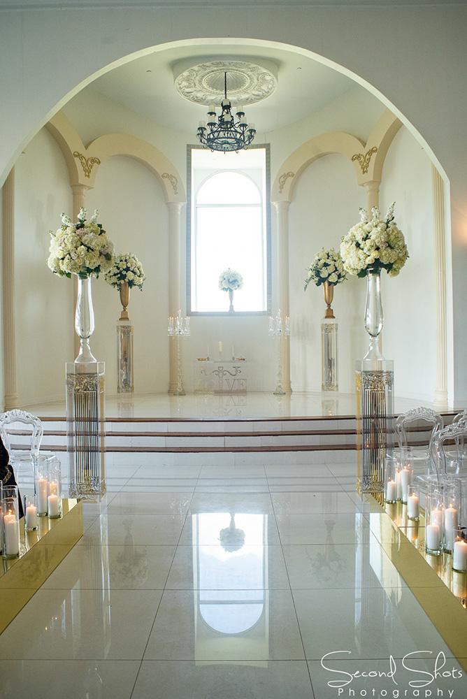 white and gold wedding decor - royal luxury events - rentals - flowers - gold chairs - fancy chairs