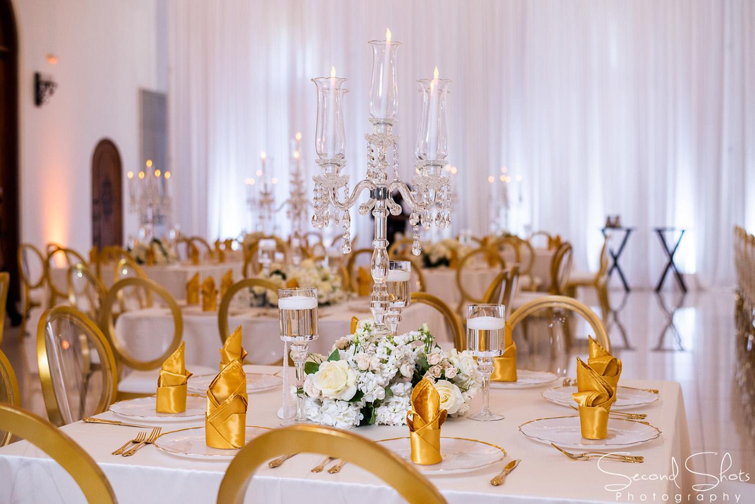 white and gold wedding decor - royal luxury events - rentals - flowers - gold chairs - fancy chairs