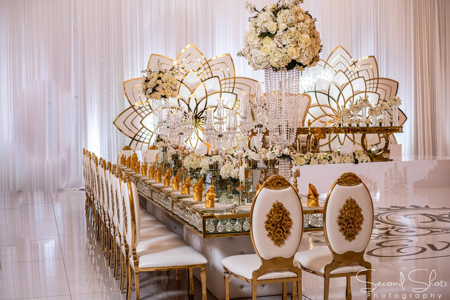 white and gold wedding decor - royal luxury events - rentals - flowers - gold chairs - fancy chairs