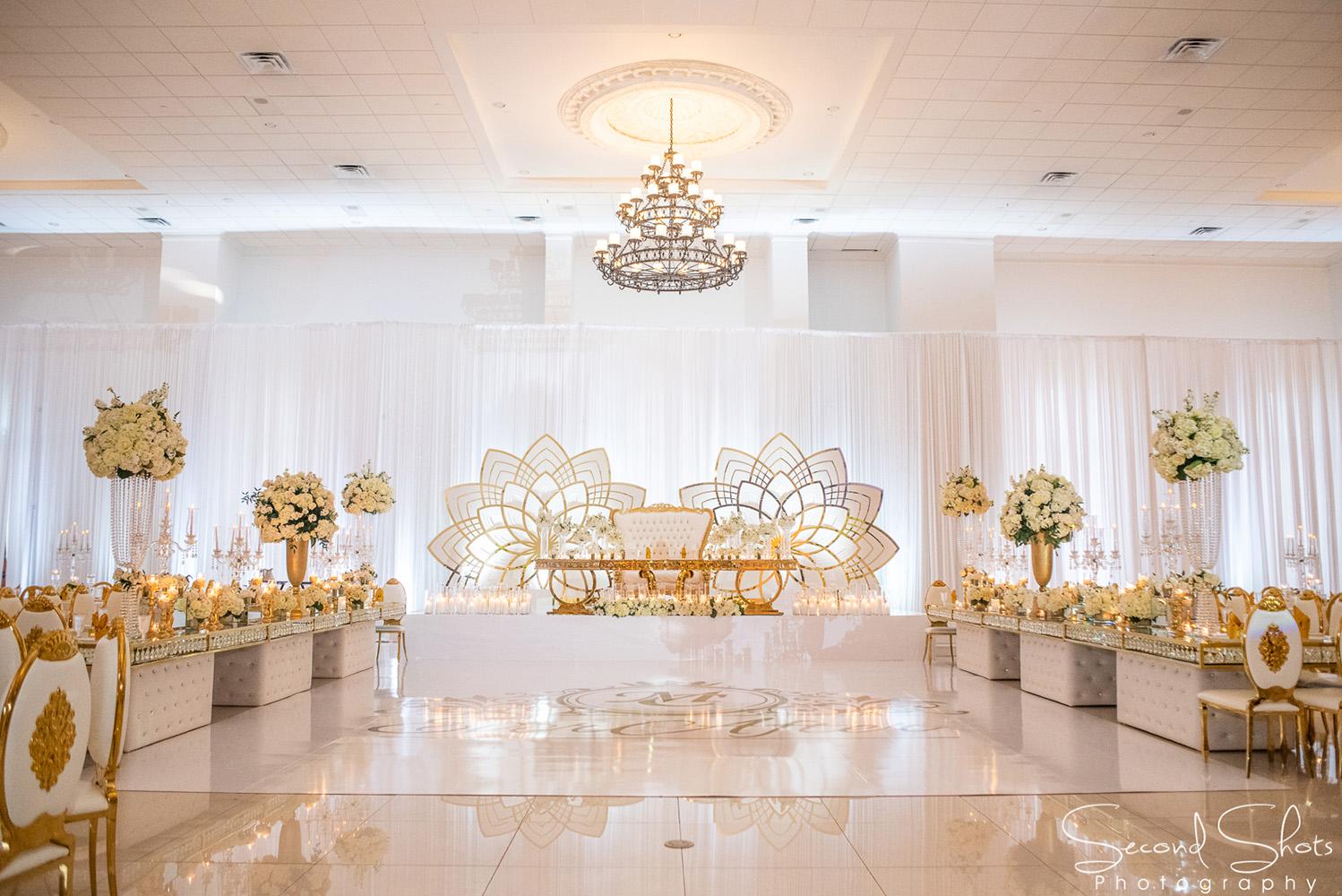 white and gold wedding decor - royal luxury events - rentals - flowers - gold chairs - fancy chairs