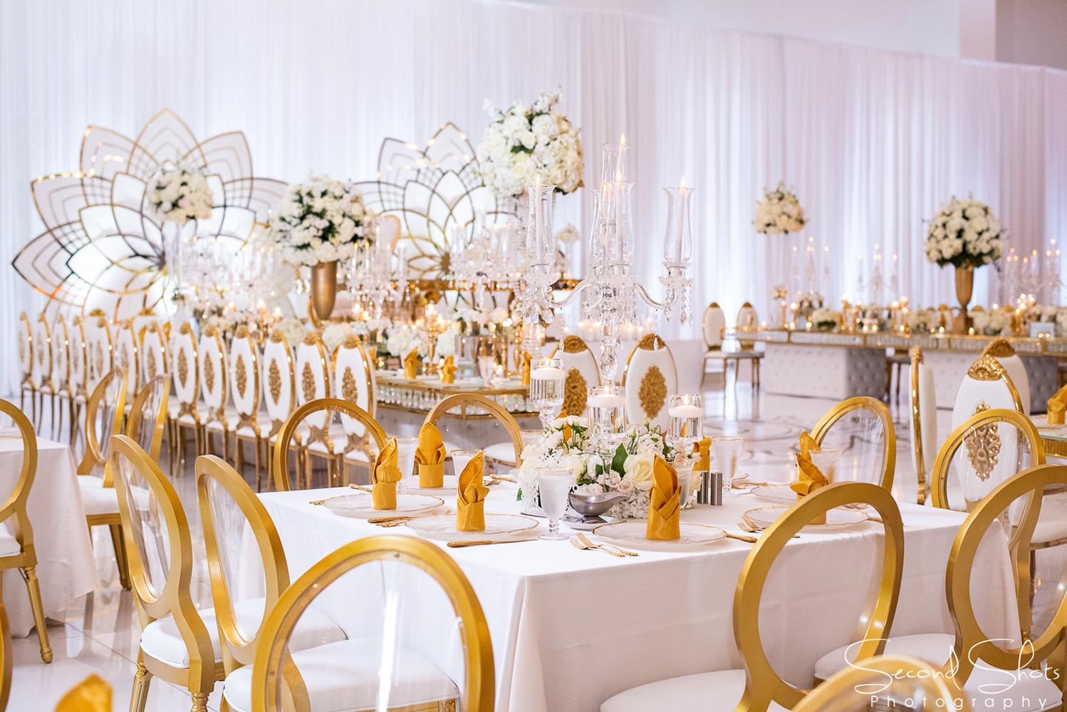 white and gold wedding decor - royal luxury events - rentals - flowers - gold chairs - fancy chairs