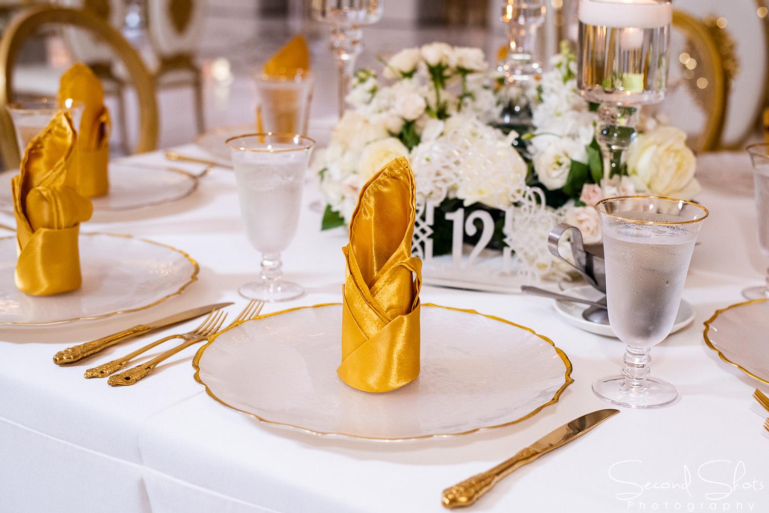 white and gold wedding decor - royal luxury events - rentals - flowers - gold chairs - fancy chairs