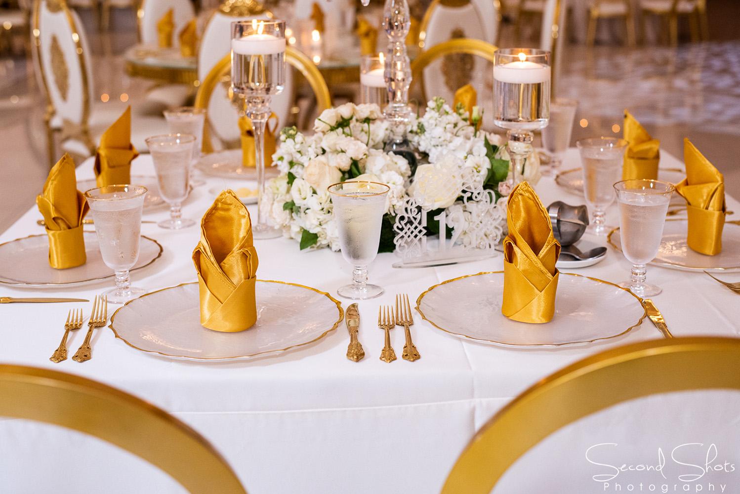 white and gold wedding decor - royal luxury events - rentals - flowers - gold chairs - fancy chairs