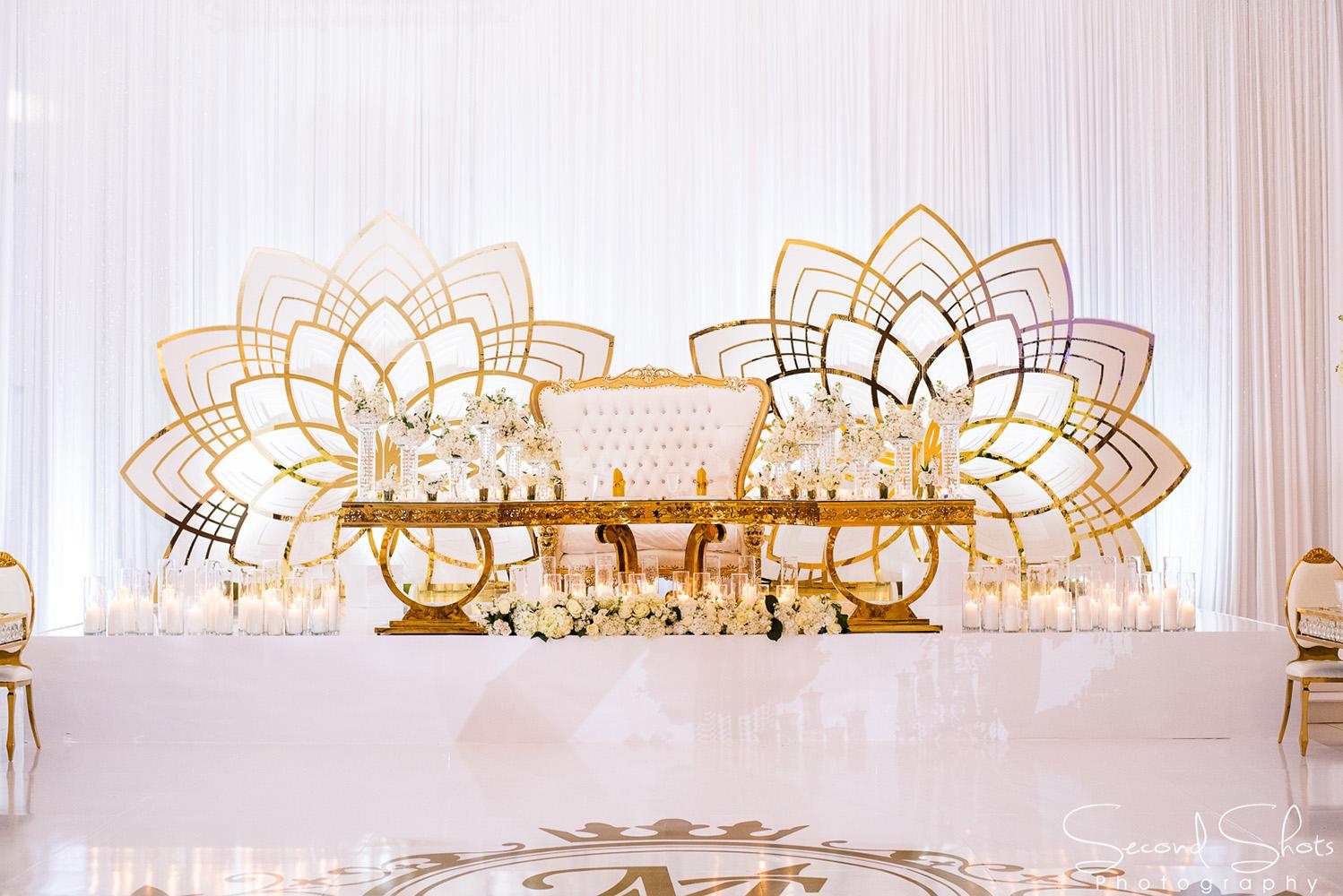 white and gold wedding decor - royal luxury events - rentals - flowers - gold chairs - fancy chairs