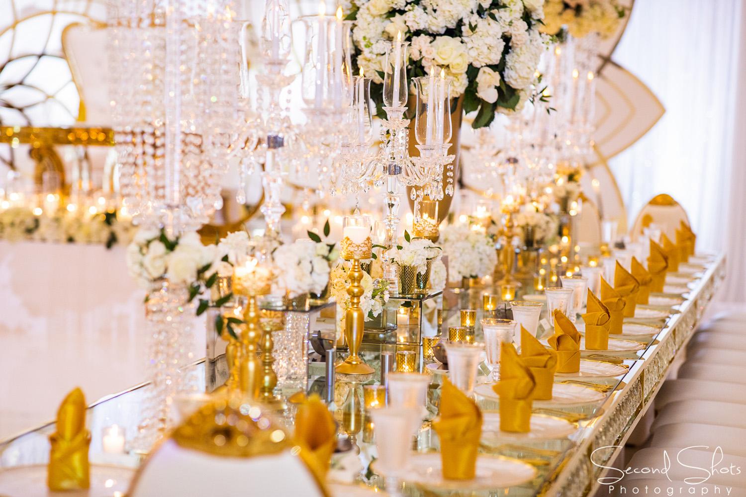 white and gold wedding decor - royal luxury events - rentals - flowers - gold chairs - fancy chairs