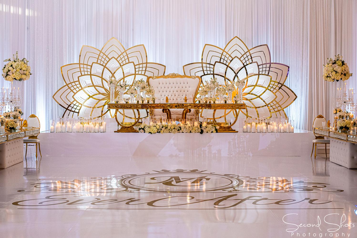 white and gold wedding decor - royal luxury events - rentals - flowers - gold chairs - fancy chairs