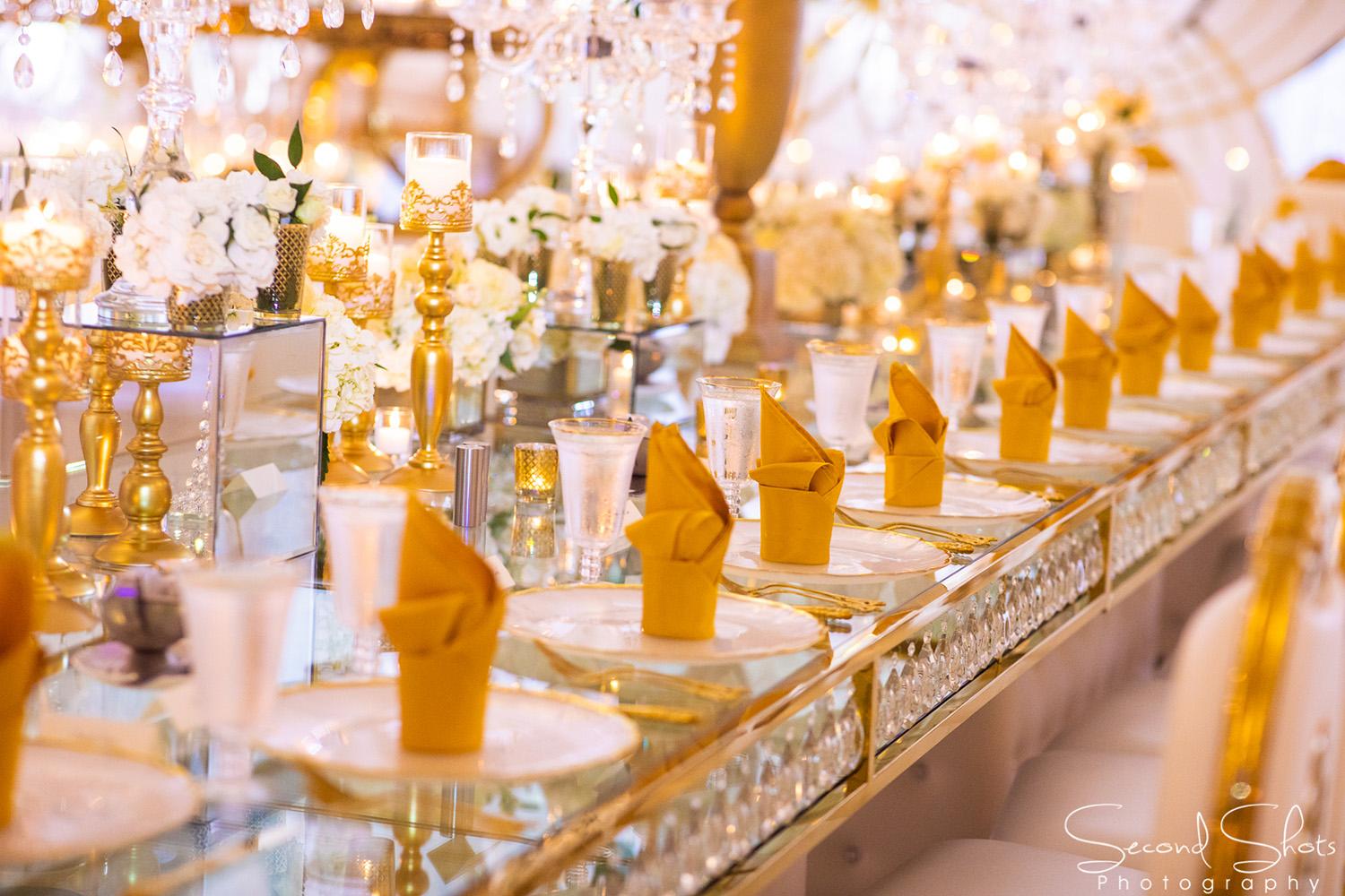 white and gold wedding decor - royal luxury events - rentals - flowers - gold chairs - fancy chairs