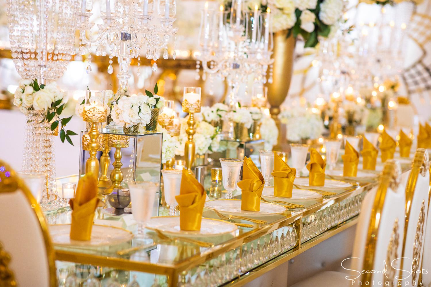 white and gold wedding decor - royal luxury events - rentals - flowers - gold chairs - fancy chairs