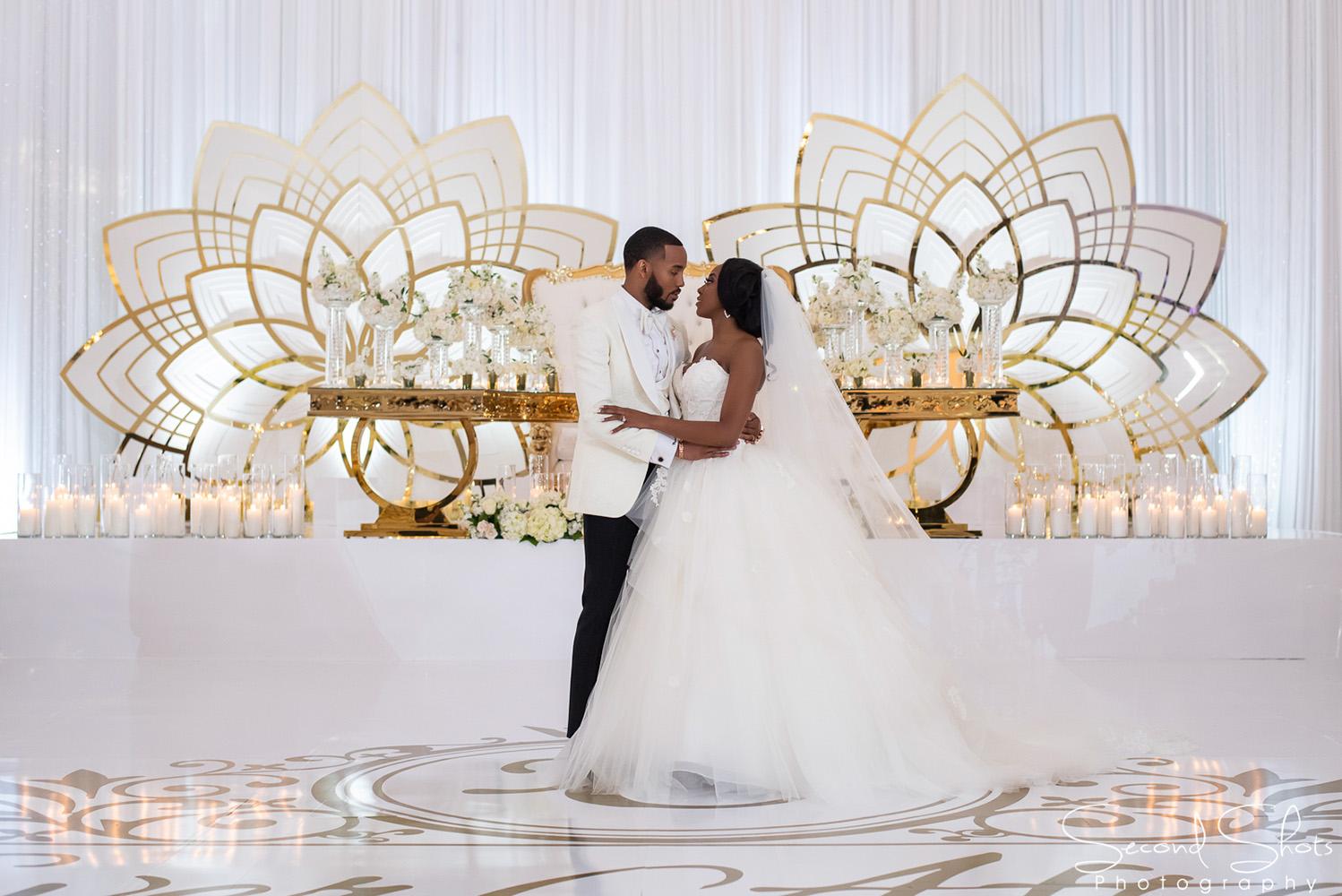white and gold wedding decor - royal luxury events - rentals - flowers - gold chairs - fancy chairs