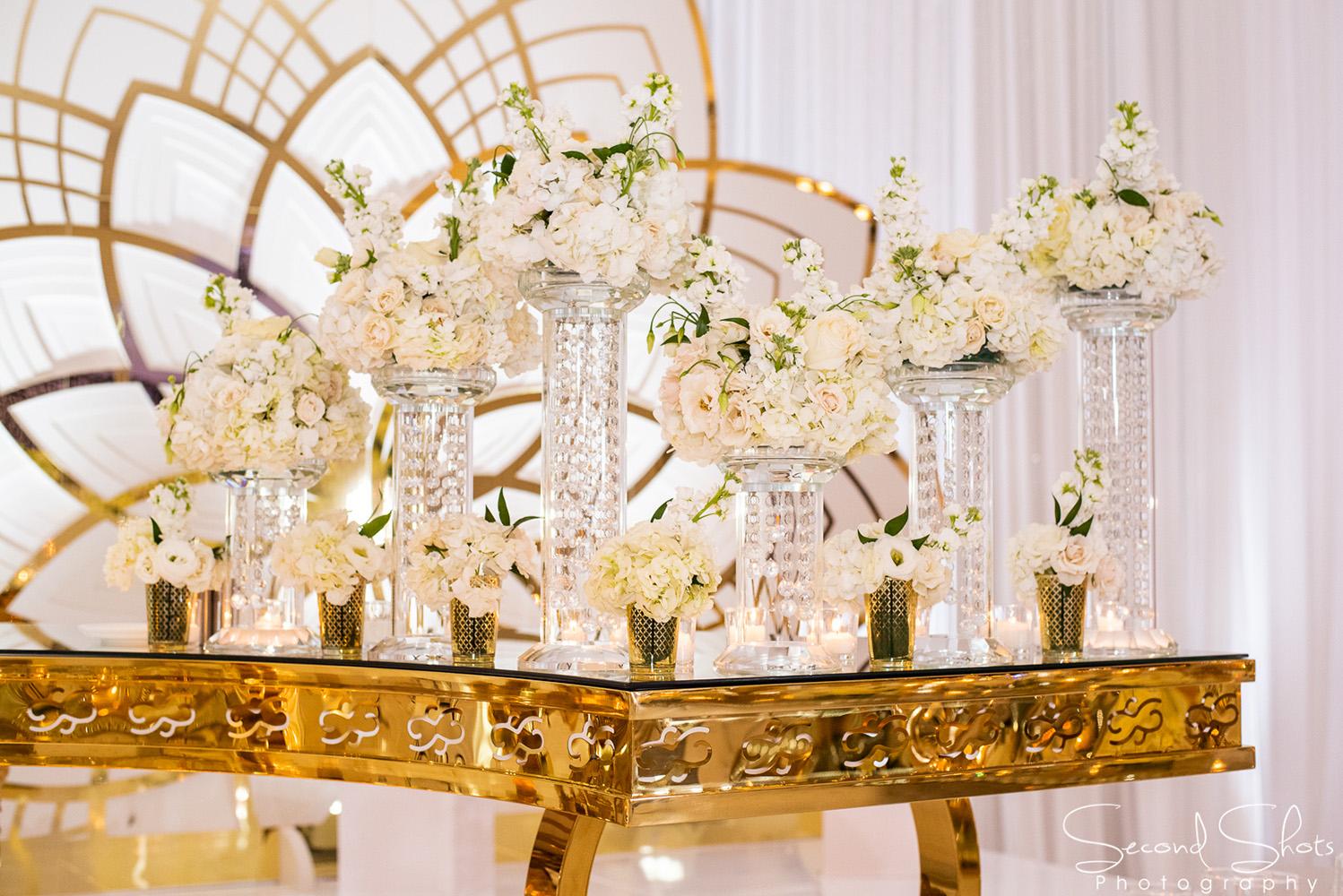 white and gold wedding decor - royal luxury events - rentals - flowers - gold chairs - fancy chairs
