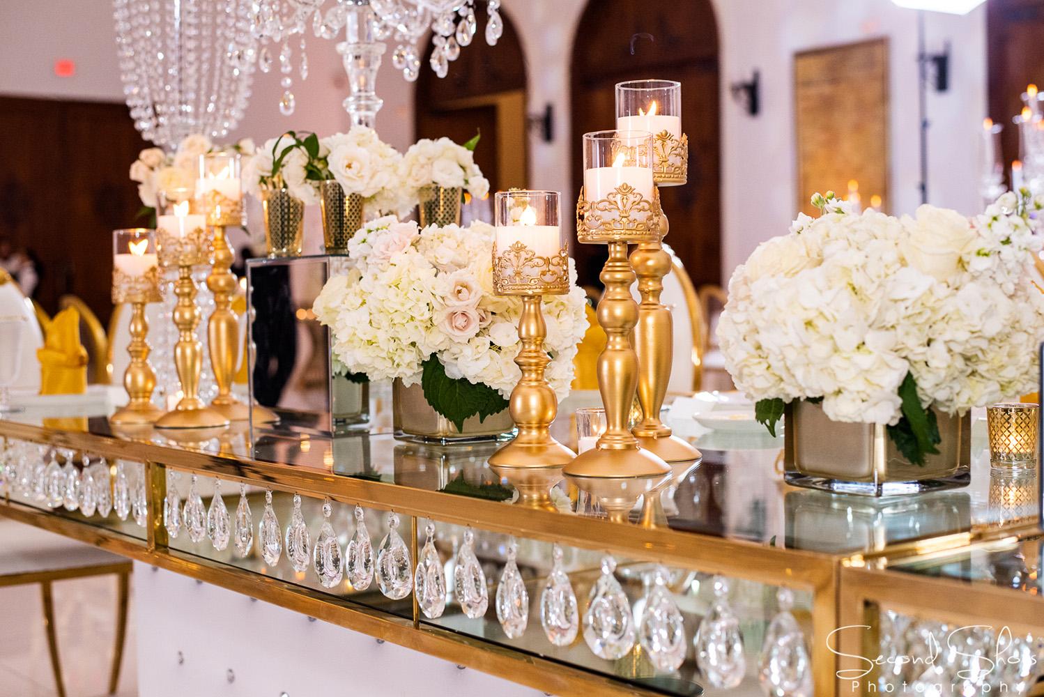 white and gold wedding decor - royal luxury events - rentals - flowers - gold chairs - fancy chairs