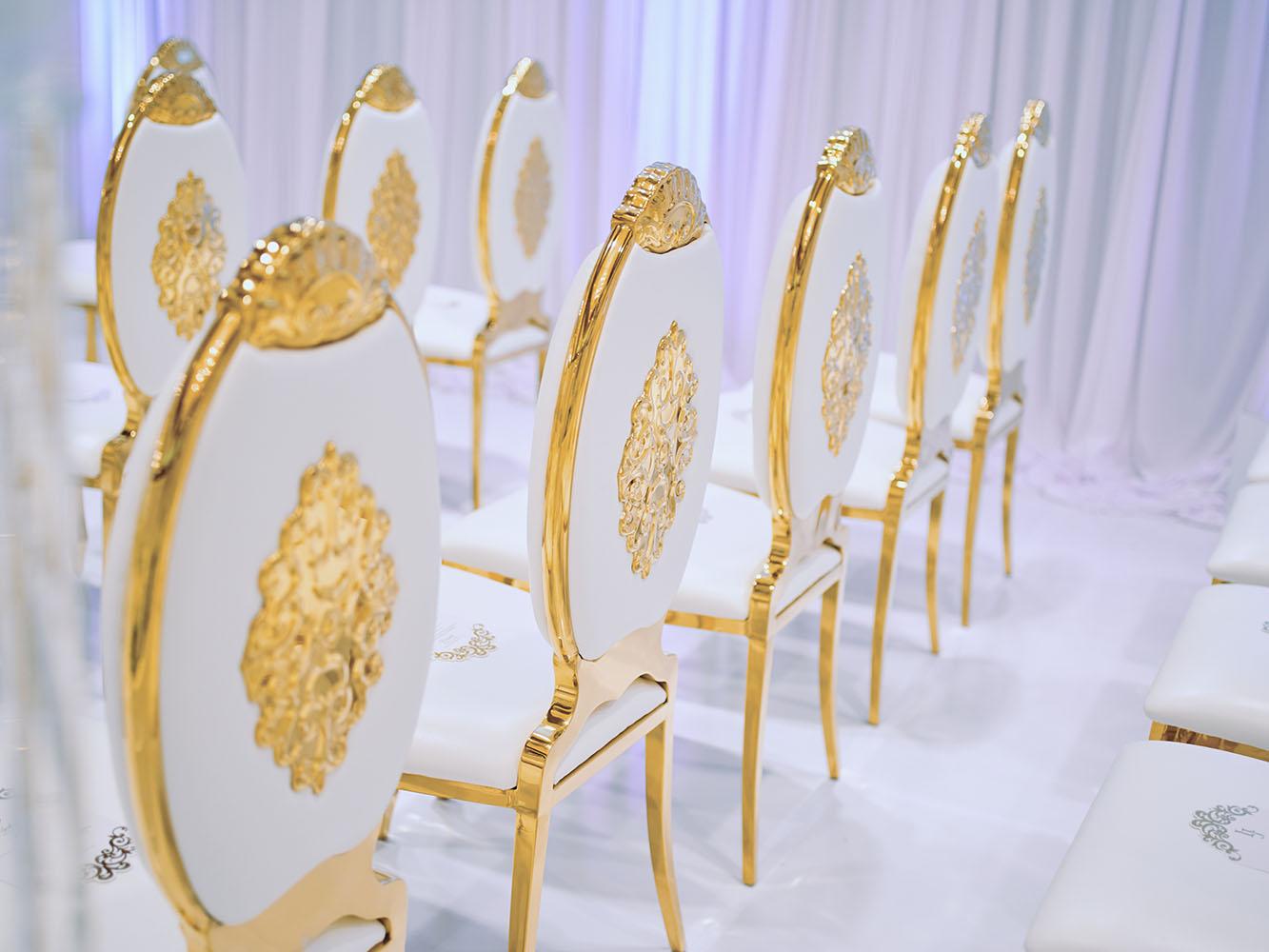 indoor wedding reception decor, white gold, wedding cake, gold chargers, mirror teardrop tables, centerpieces, florist, houstonian, luxury wedding in houston