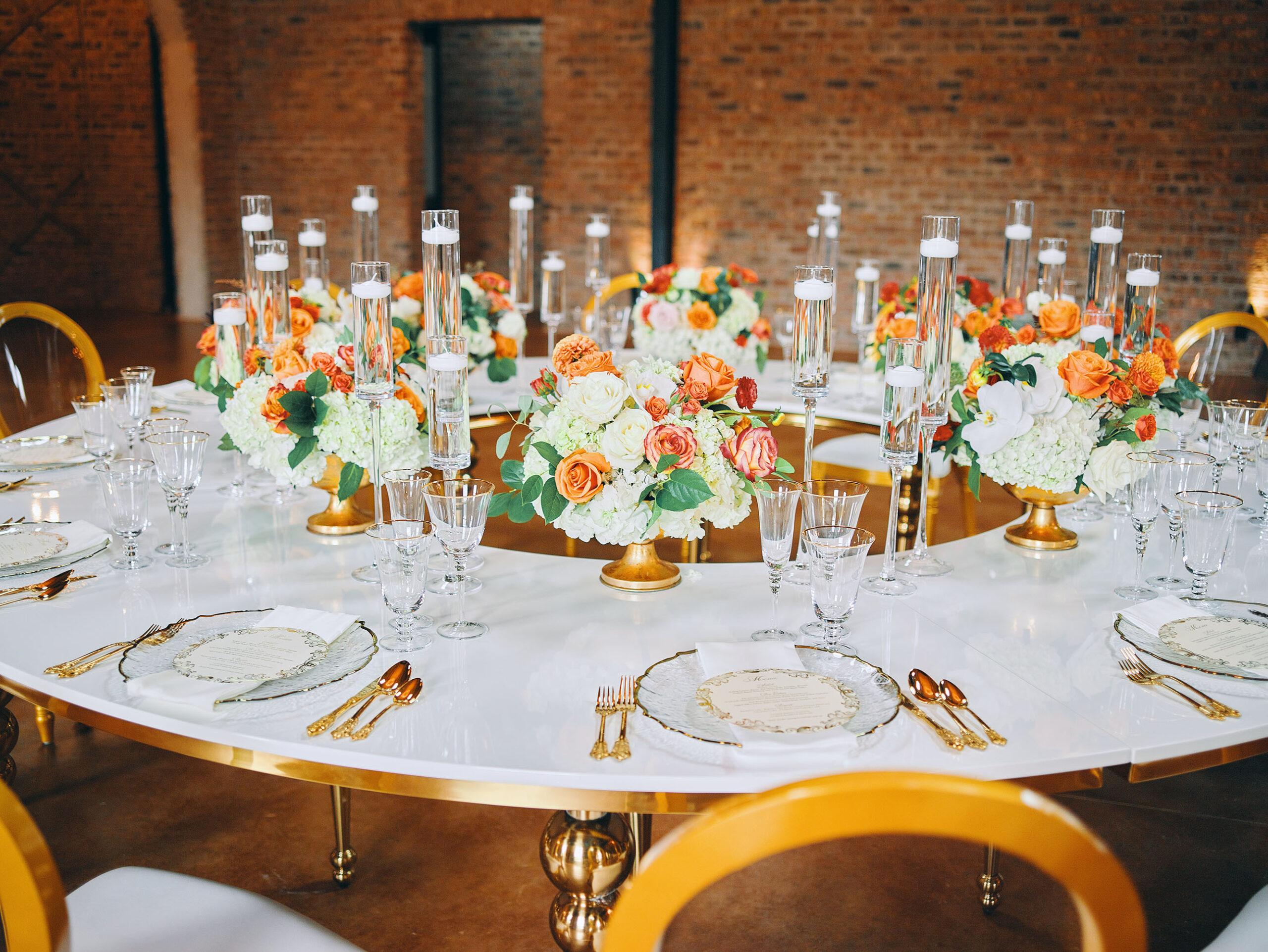 luxurious indoor wedding reception decor - gold luxury chairs