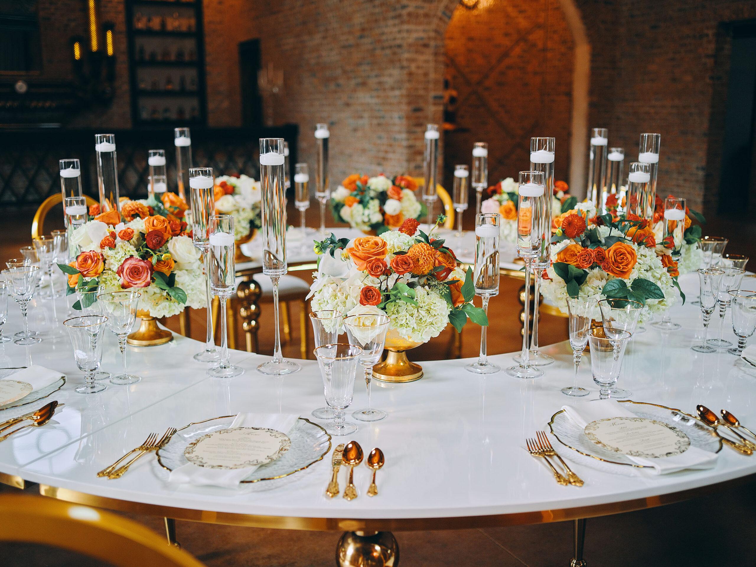 luxurious indoor wedding reception decor - gold luxury chairs