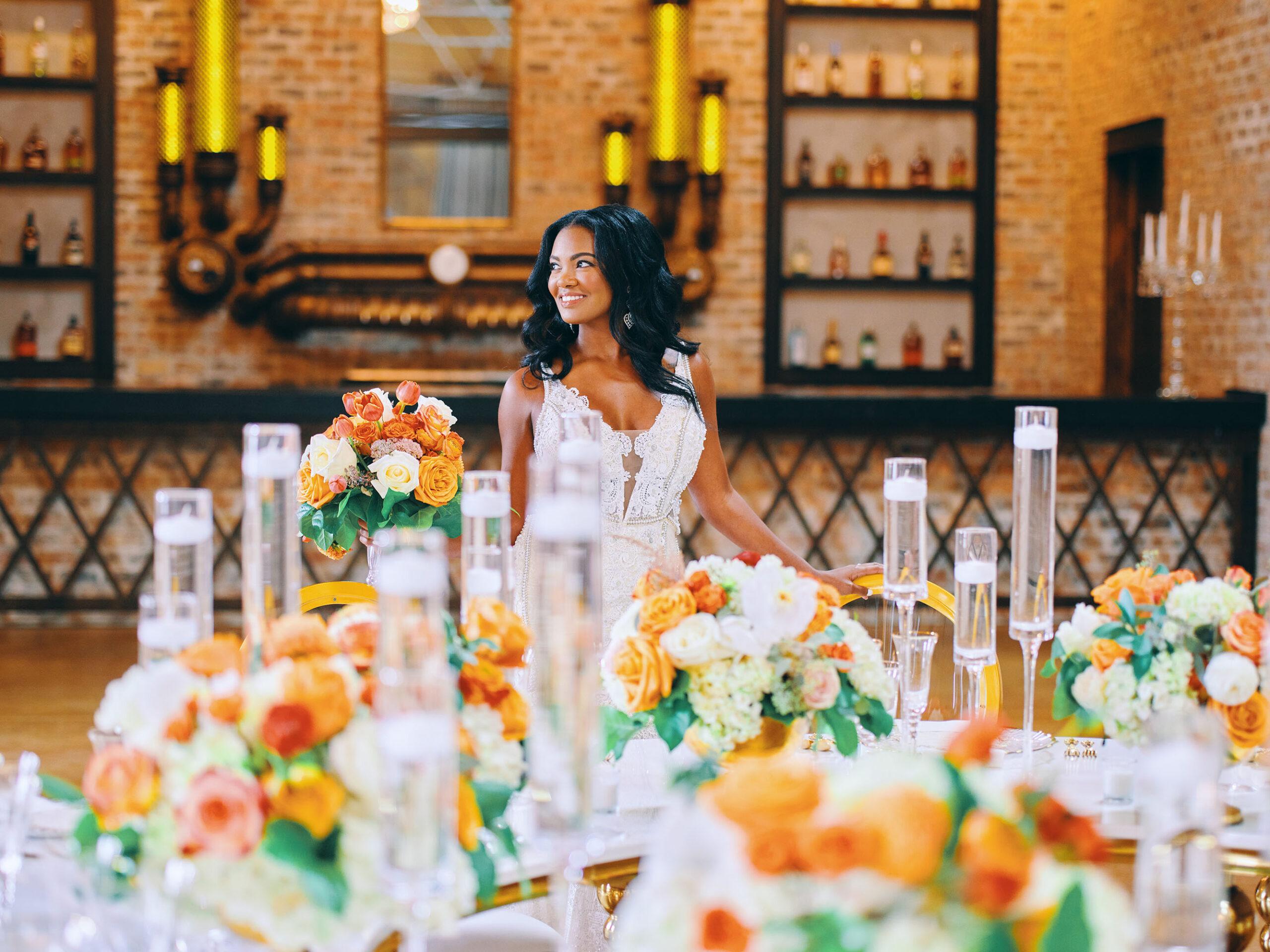 luxurious indoor wedding reception decor - gold luxury chairs - round table