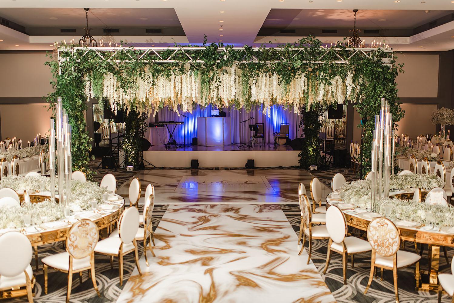 Wisteria, Baby's Breath, reception decor, omni houston, wedding decor, florist in houston, gold round table