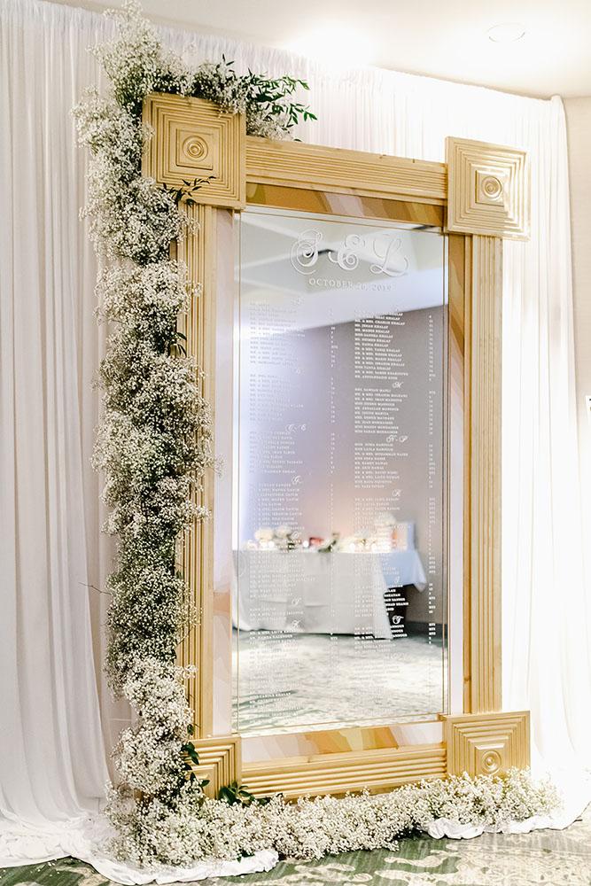 Wisteria, Baby's Breath, reception decor, omni houston, wedding decor, florist in houston, gold round table, mirror seating chart