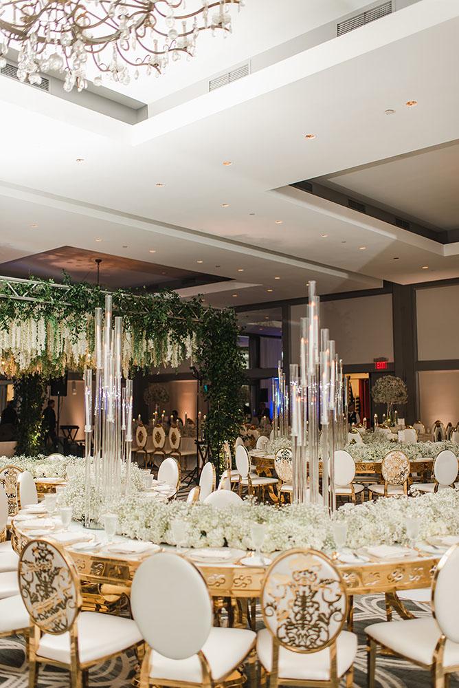 Wisteria, Baby's Breath, reception decor, omni houston, wedding decor, florist in houston, gold round table, mirror seating chart