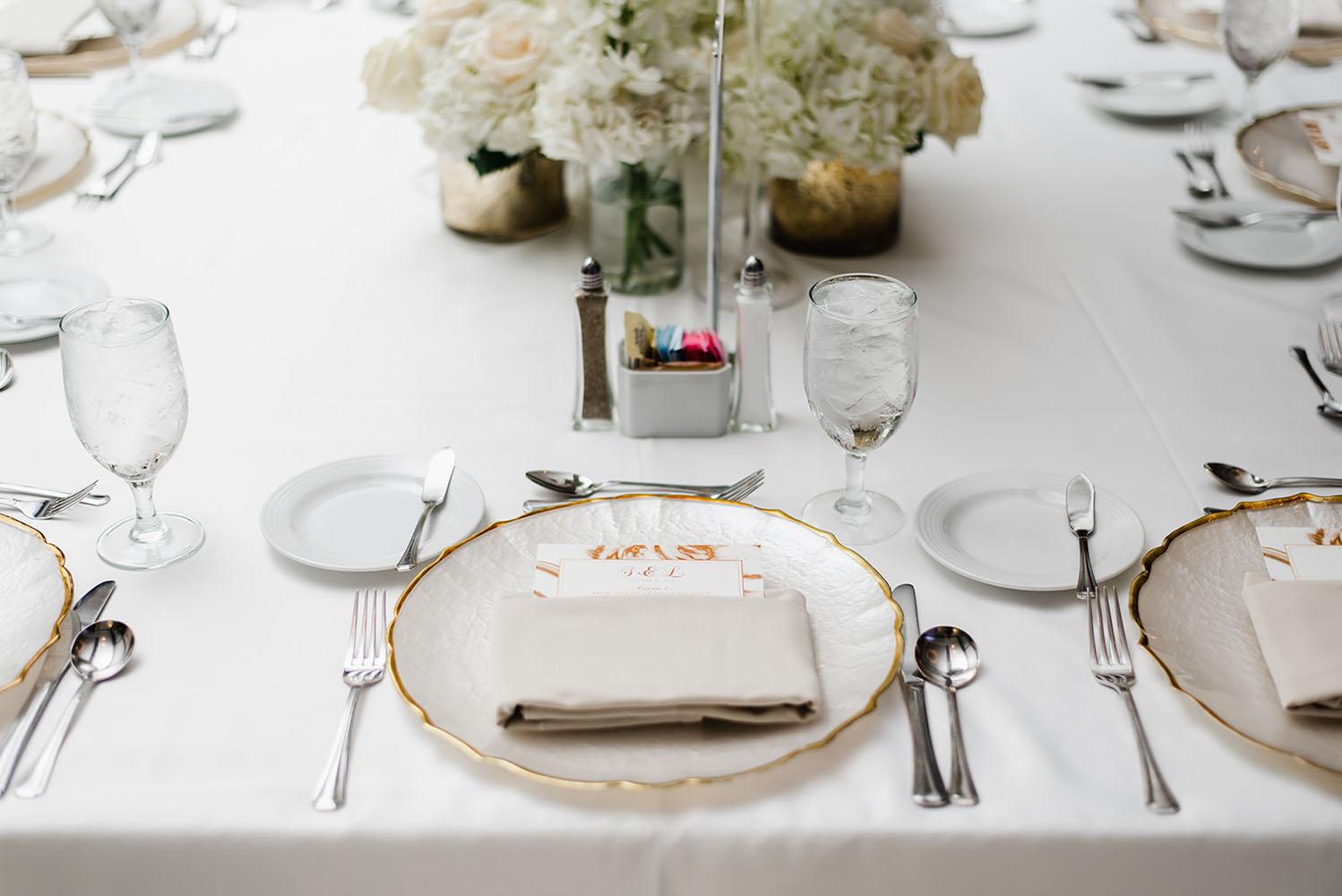 Wisteria, Baby's Breath, reception decor, omni houston, wedding decor, florist in houston, gold round table, mirror seating chart