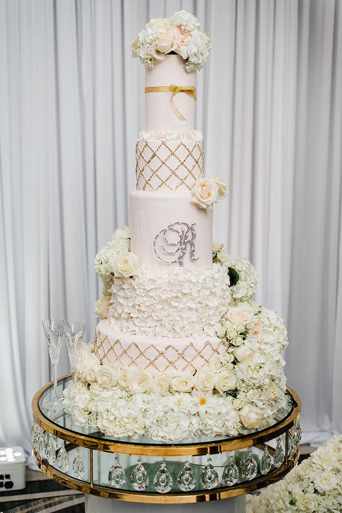 Wisteria, Baby's Breath, reception decor, omni houston, wedding decor, florist in houston, gold round table, mirror seating chart, wedding cake