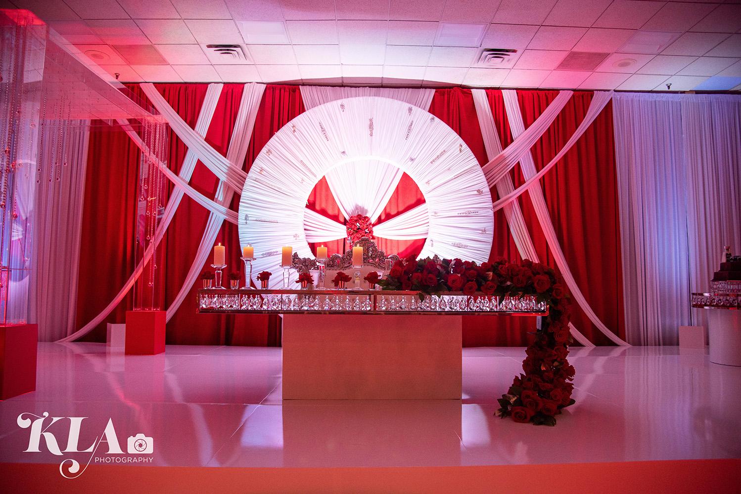 red wedding - luxury - crystal table - white chairs - ghost chairs - rentals in houston - royal luxury