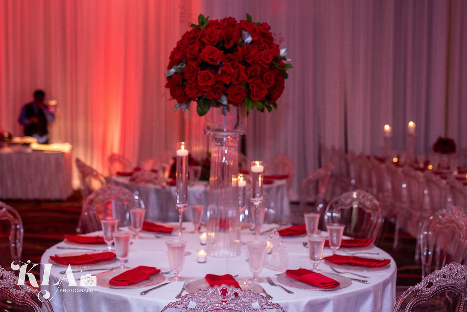 red wedding - luxury - crystal table - white chairs - ghost chairs - rentals in houston - royal luxury