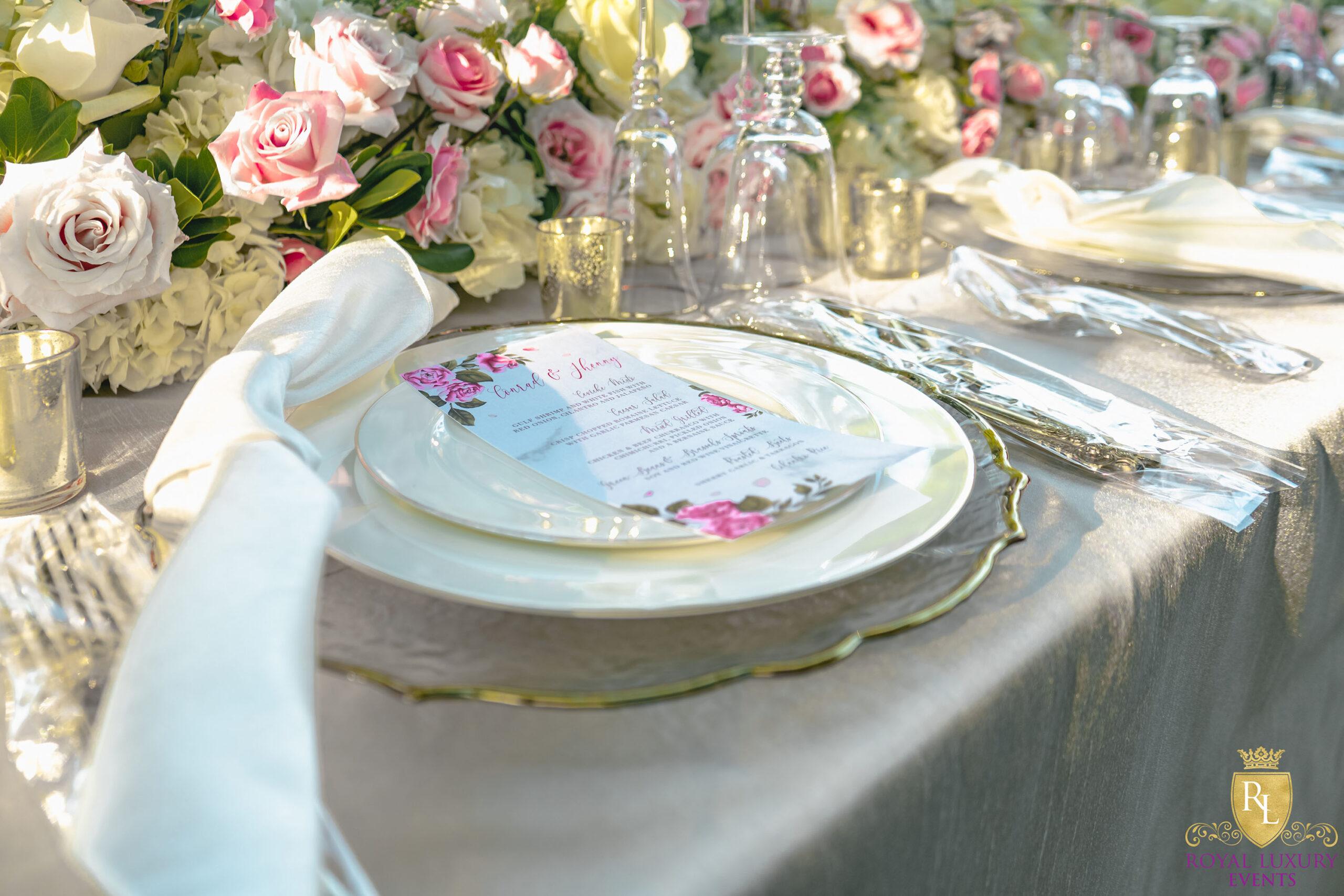 intimate backyard wedding decor featured pastel florals, white chairs, a greenery wall, and many other unique details - houston wedding decor