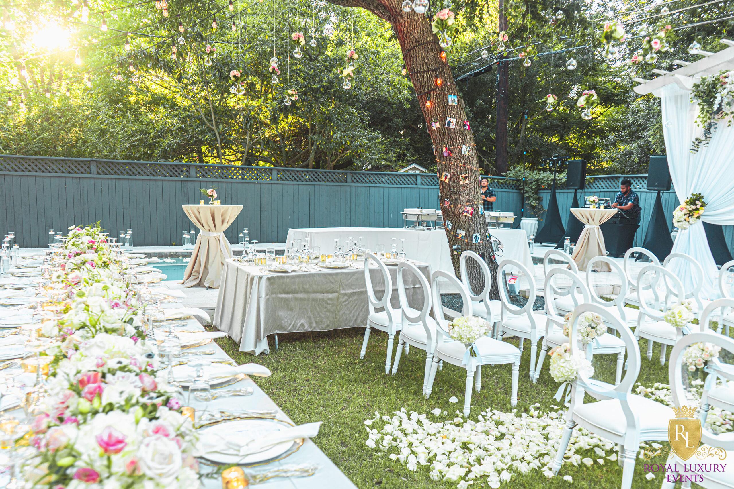 intimate backyard wedding decor featured pastel florals, white chairs, a greenery wall, and many other unique details - houston wedding decor