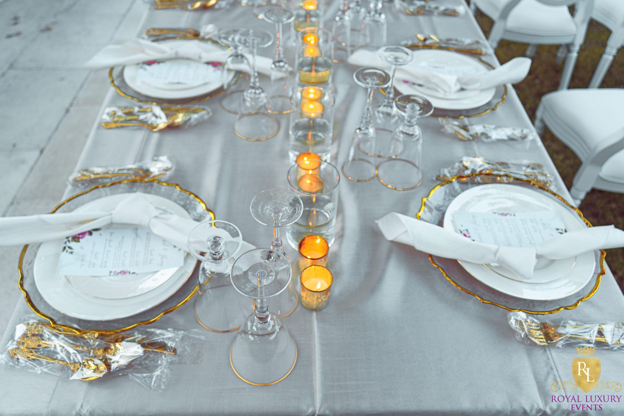 intimate backyard wedding decor featured pastel florals, white chairs, a greenery wall, and many other unique details - houston wedding decor