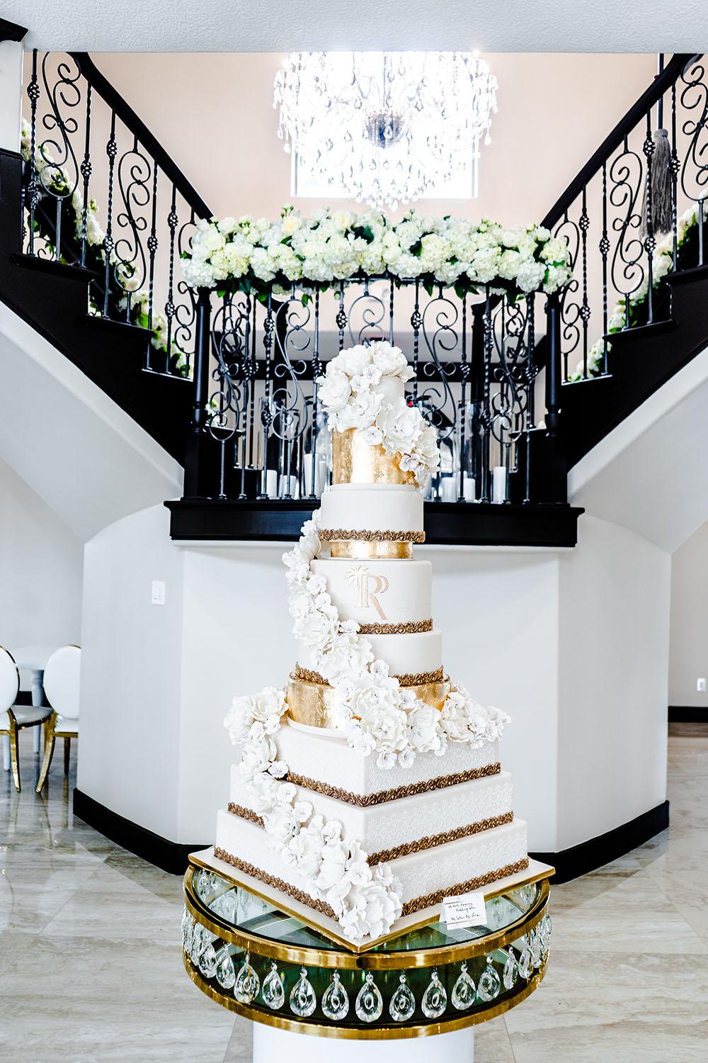 wedding cake floral staircase runner - palm royal villa - royal luxury events