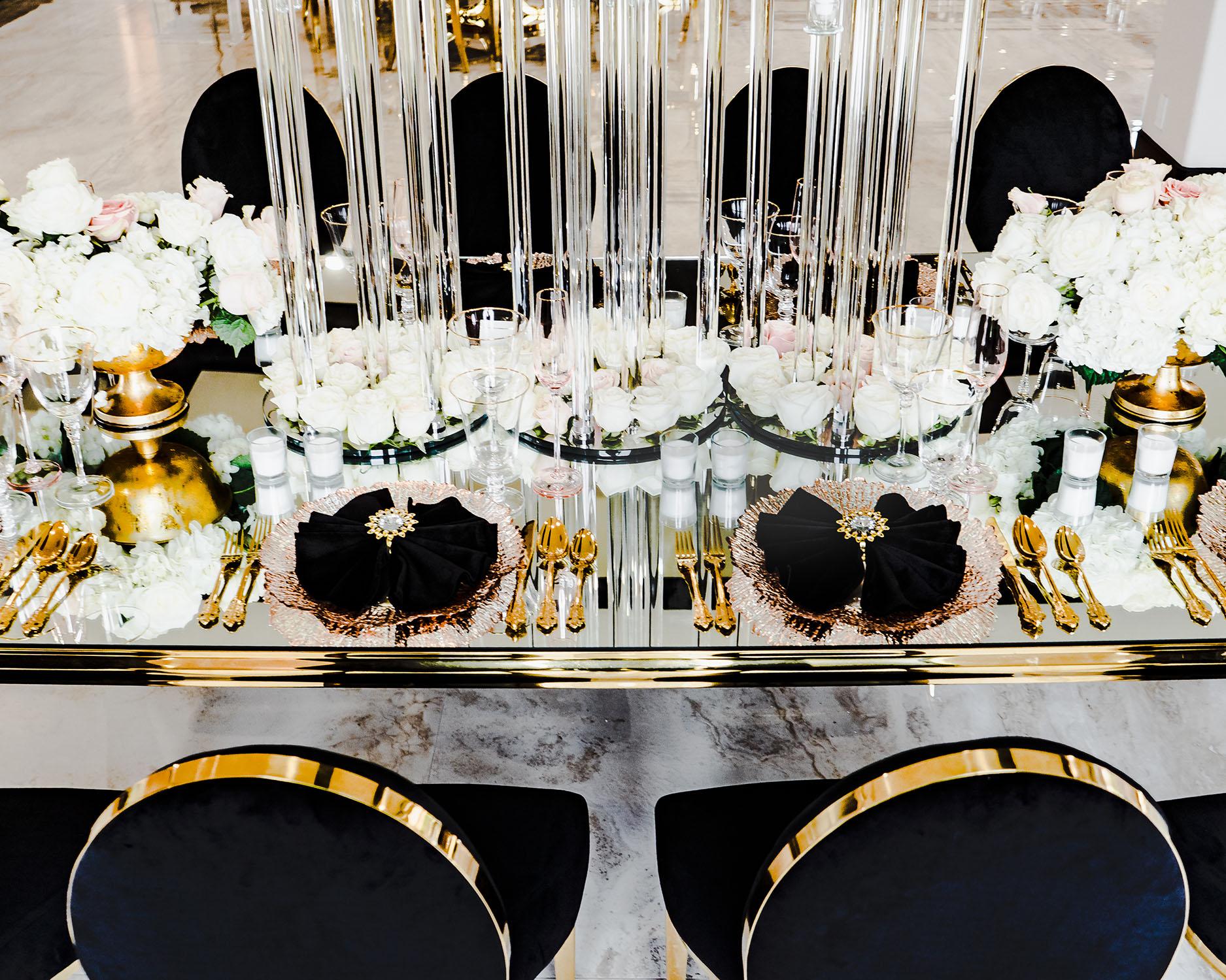 mirror table with black chairs - palm royal villa - royal luxury events