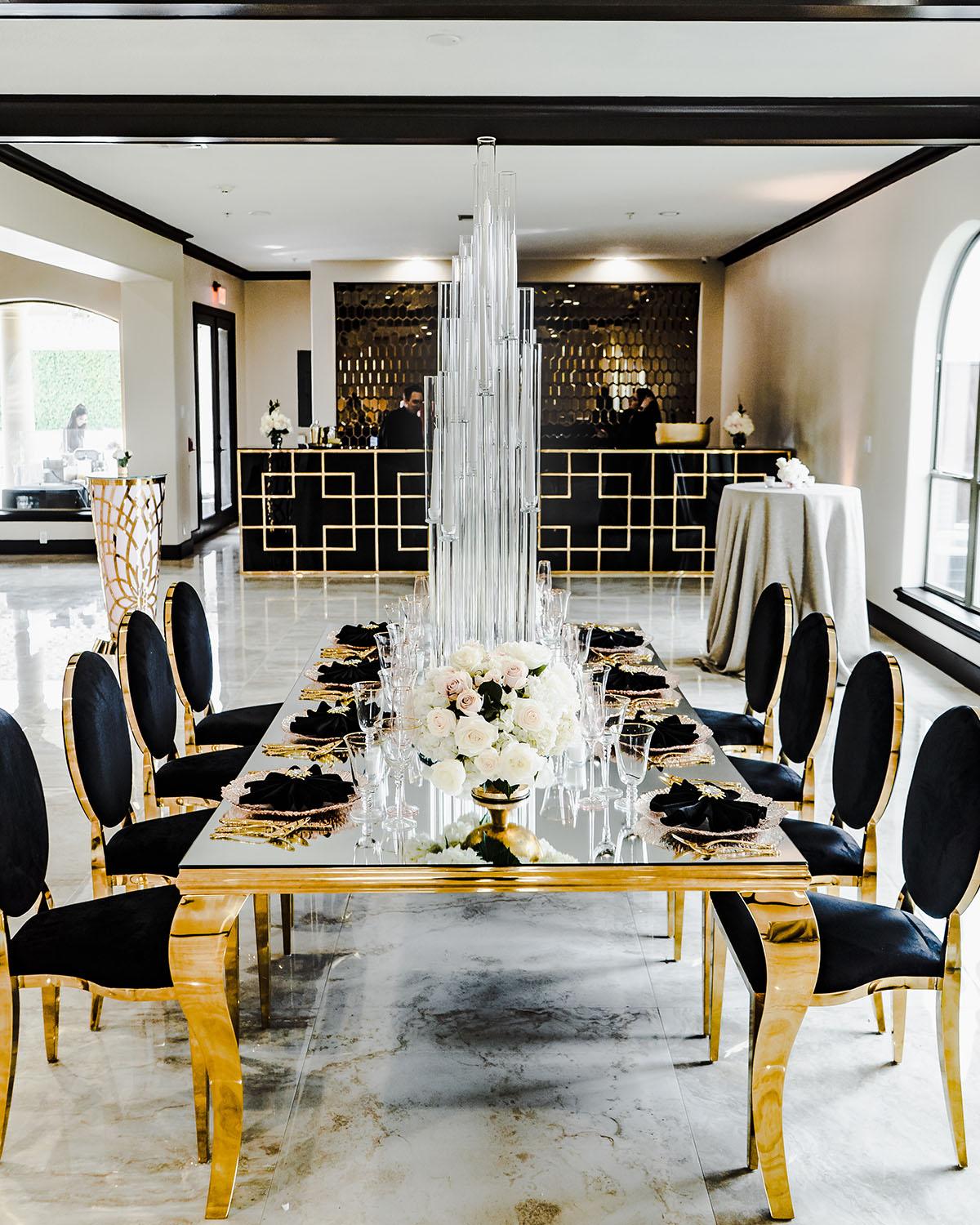 mirror table with black chairs - palm royal villa - royal luxury events
