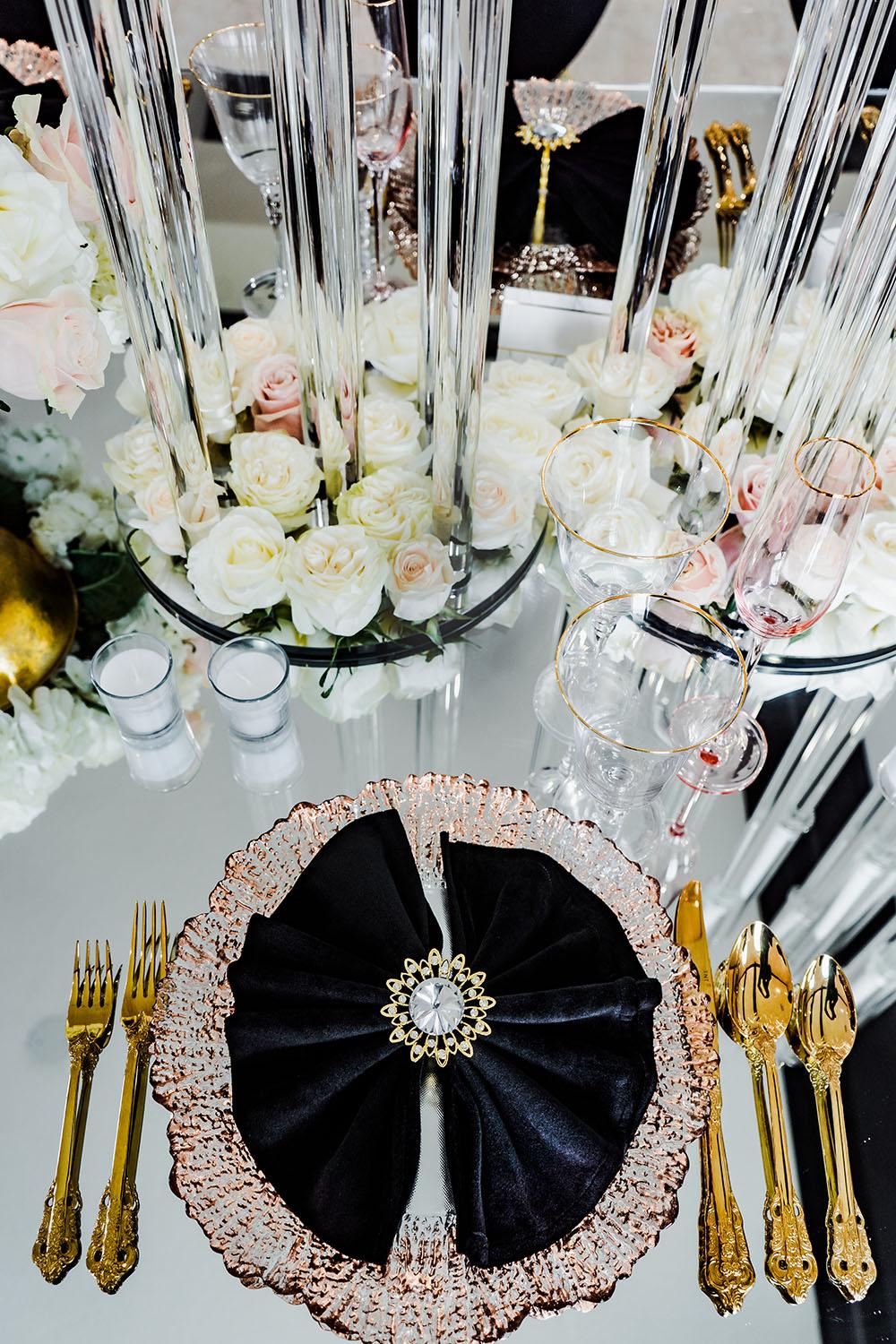 mirror table with black chairs - palm royal villa - royal luxury events