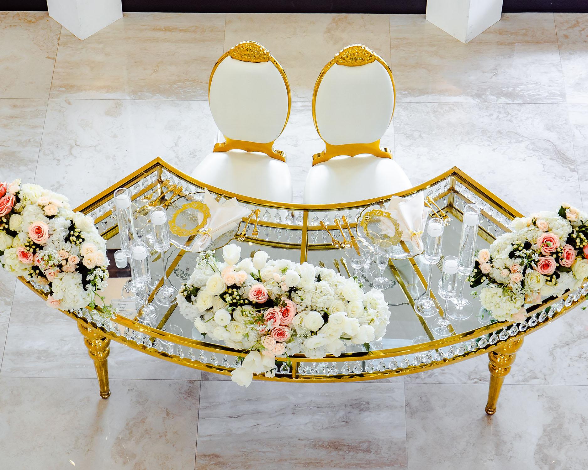 curved crystal table gold - palm royal villa - royal luxury events