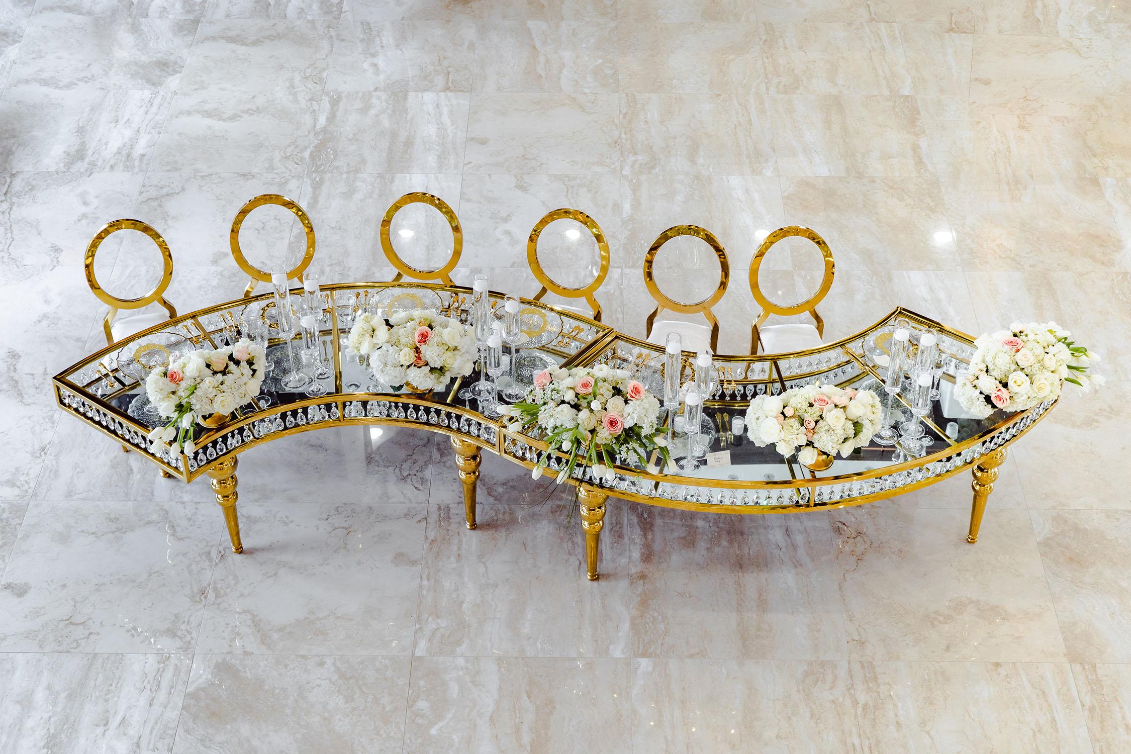 elegant and luxurious decor for Palm Royal Villa’s Grand Opening Open House in Katy, Texas. We showcased a variety of wedding decor ideas including our luxury chairs, crystal tables, elegant charger plates, tableware