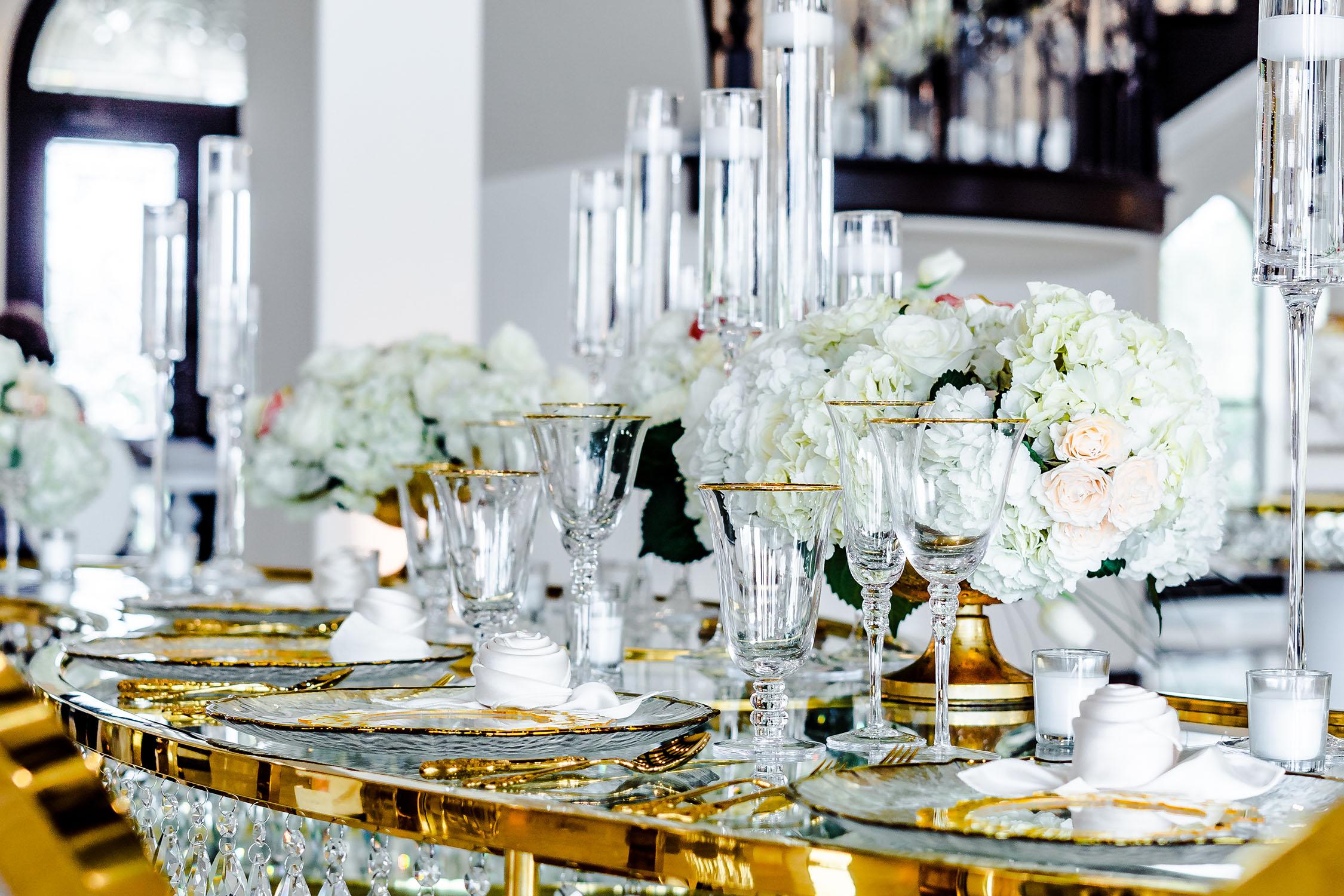 elegant and luxurious decor for Palm Royal Villa’s Grand Opening Open House in Katy, Texas. We showcased a variety of wedding decor ideas including our luxury chairs, crystal tables, elegant charger plates, tableware