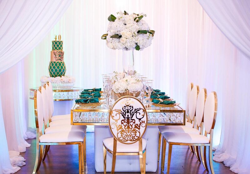 View this emerald green luxury birthday decor featuring gold crystal tables and gold chairs by Royal Luxury Events in Houston, Texas.