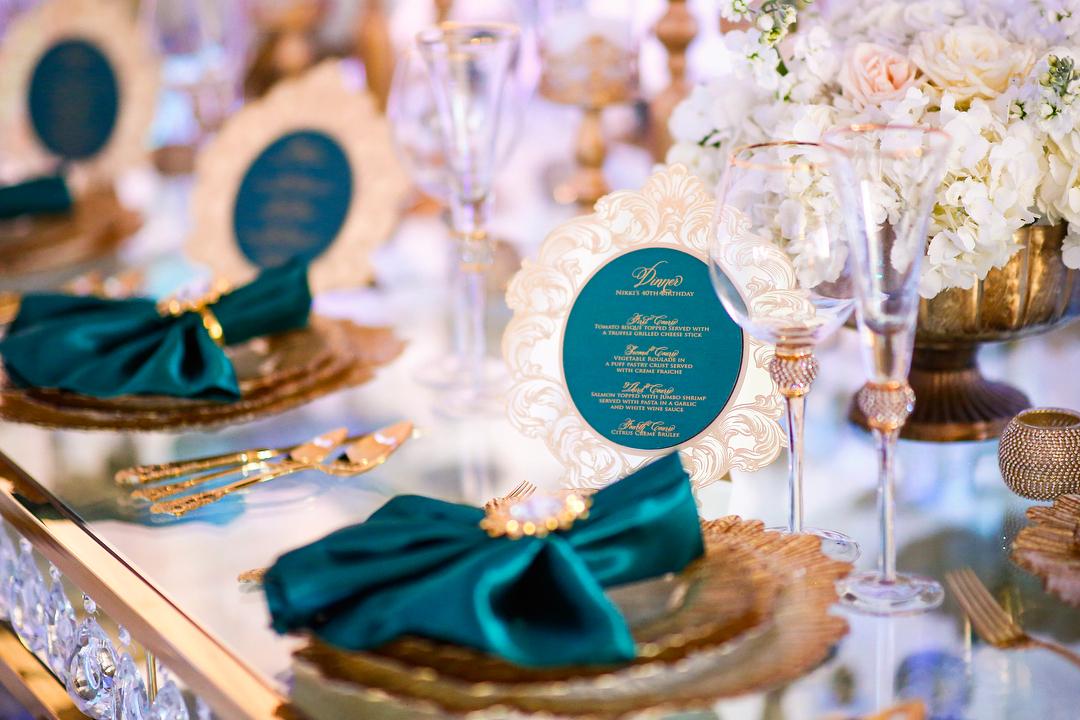 View this emerald green luxury birthday decor featuring gold crystal tables and gold chairs by Royal Luxury Events in Houston, Texas.