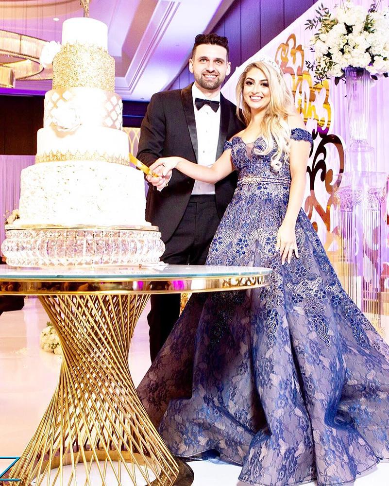 View this luxurious engagement party decor at The Post Oak Hotel at Uptown Houston. Featuring gold chairs, charger plates, & sweetheart table.