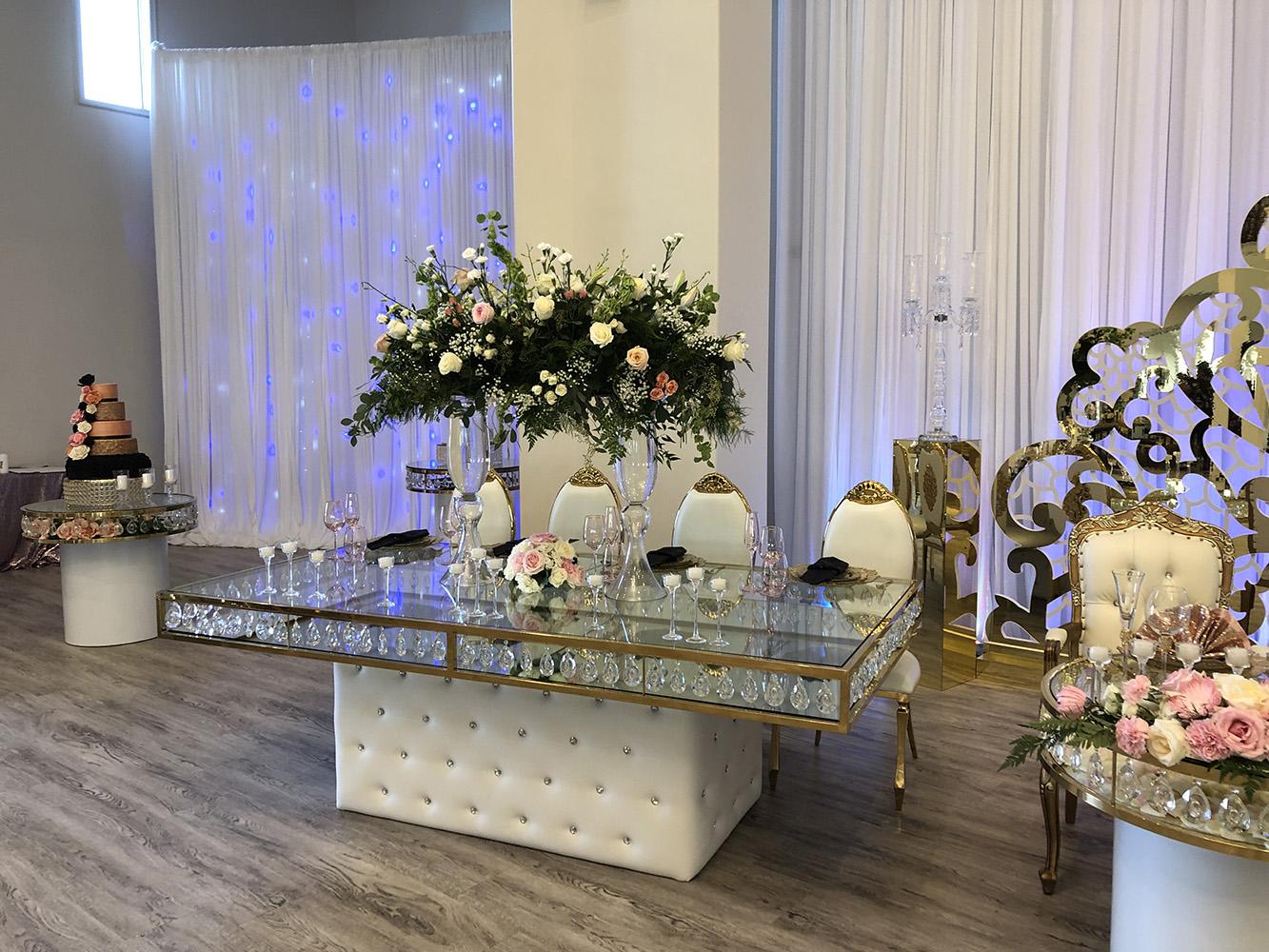 Knotting Hill Place in Dallas, Texas by Royal Luxury Events. Featuring our black and gold chairs, serpentine table, gold crystal tables, white and gold chairs, backdrops and more.