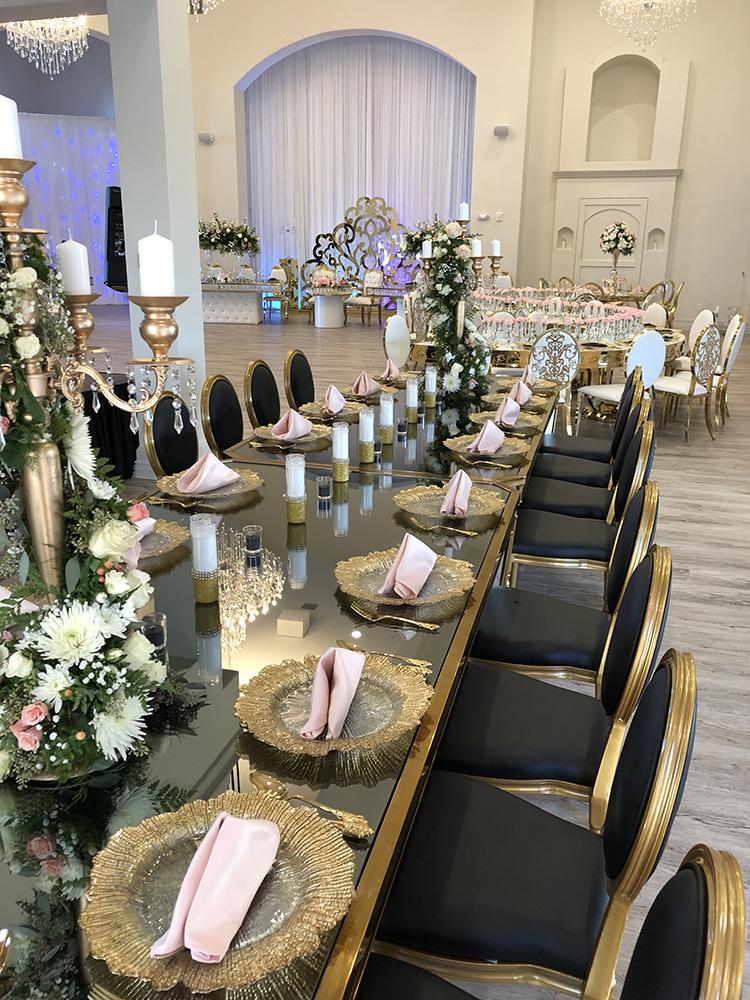 Knotting Hill Place in Dallas, Texas by Royal Luxury Events. Featuring our black and gold chairs, serpentine table, gold crystal tables, white and gold chairs, backdrops and more.