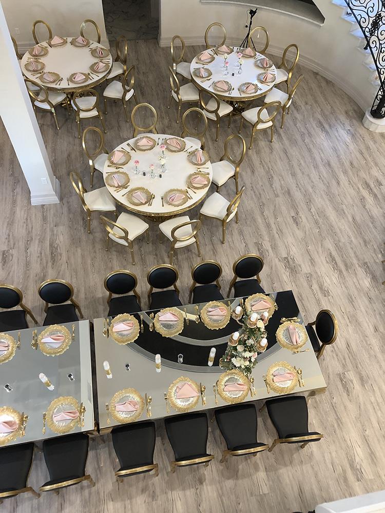 Knotting Hill Place in Dallas, Texas by Royal Luxury Events. Featuring our black and gold chairs, serpentine table, gold crystal tables, white and gold chairs, backdrops and more.